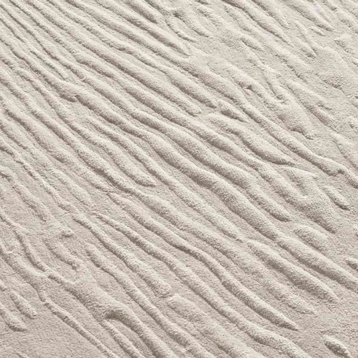 Tappeto su misura con texture tridimensionale in rilievo realizzato da Tappezziere Dell’Orto Milano